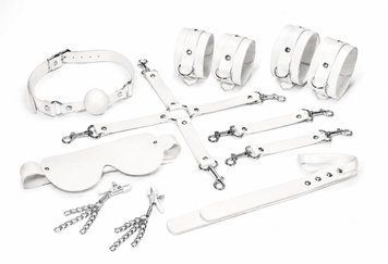 Набор Feral Feelings BDSM Kit 7 White, наручники, поножи, коннектор, маска, паддл, кляп, зажимы 3031280475 фото